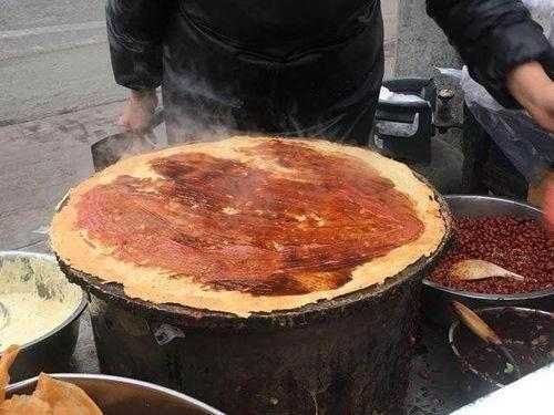 网红煎饼摊摊主是谁,揭秘神秘摊主背后的传奇故事